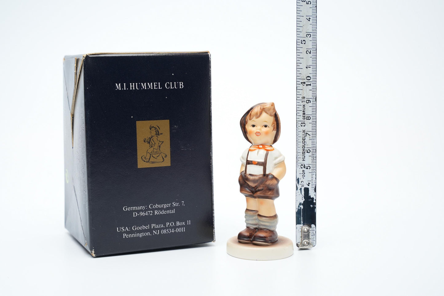 Goebel Hummel Figurine “Jungbauer – For Keeps” (Hum 630, 9 cm/3,5 inch)