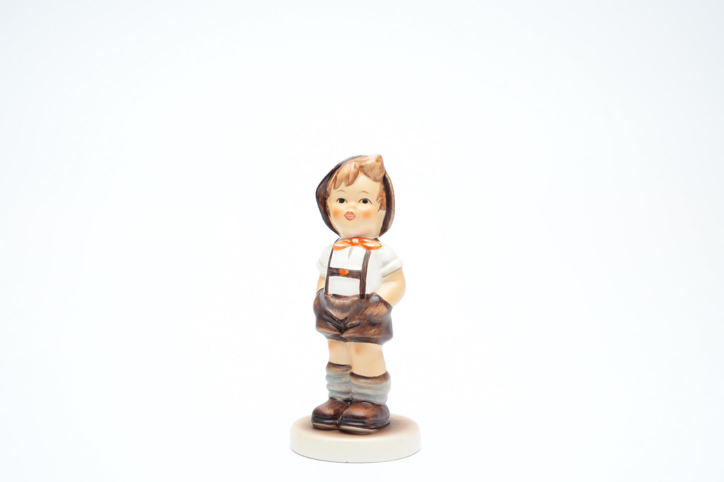 Goebel Hummel Figurine “Jungbauer – For Keeps” (Hum 630, 9 cm/3,5 inch)