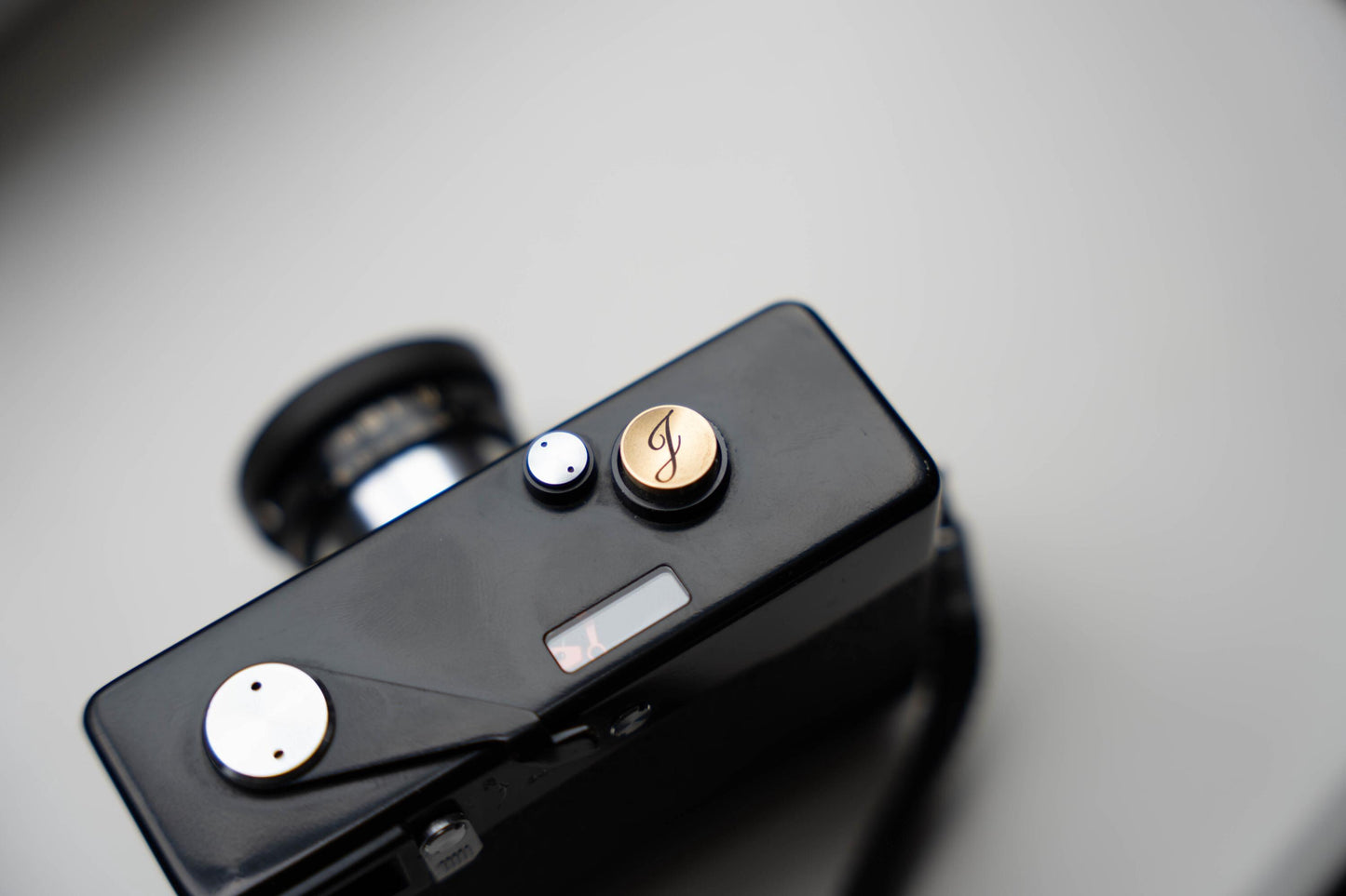 Laser gegraveerde ontspanknop voor jouw camera