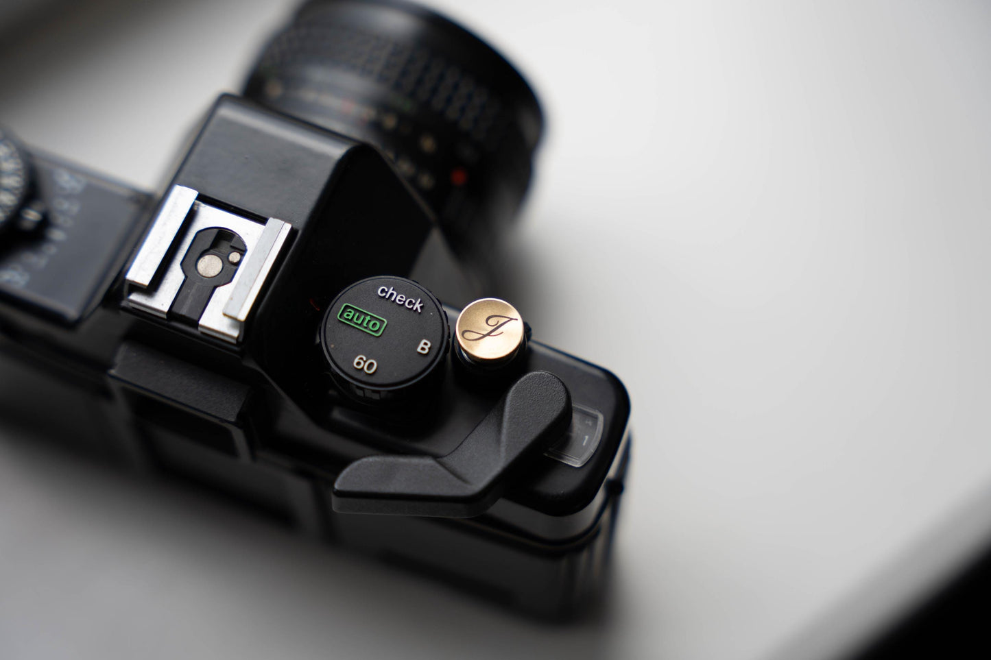 Laser gegraveerde ontspanknop voor jouw camera